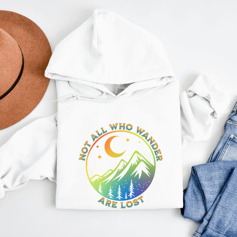 This hoodie features a colorful mountain graphic on the front and the inspiring saying "Not All Who Wander Are Lost" printed on the front.